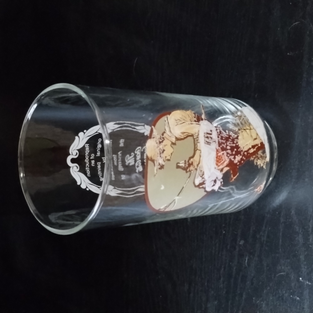 Two vintage Coca Cola Norman Rockwell glasses